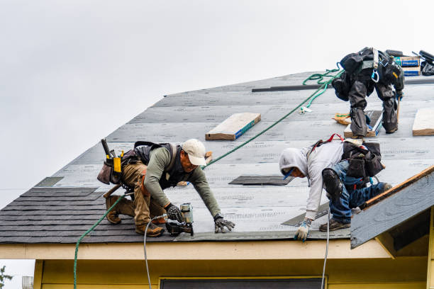 Professional Roof Replacement technician working in Rootstown, OH